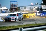 BMW leading several cars